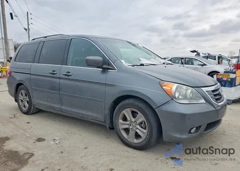 2010 Honda Odyssey Touring z USA, uszkodzony, nr VIN 5FNRL3H96AB069183